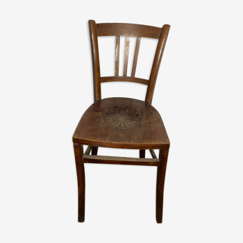 Antique bistro chair with pattern