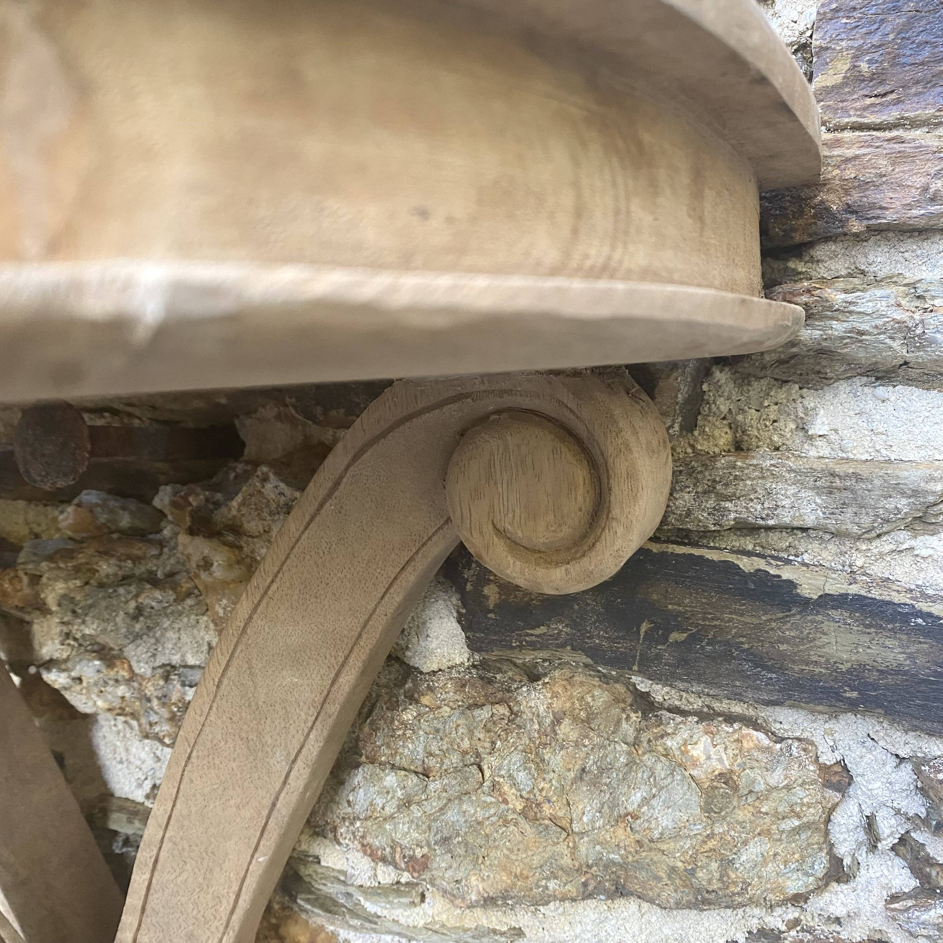 carved wooden wall shelf or wall console
