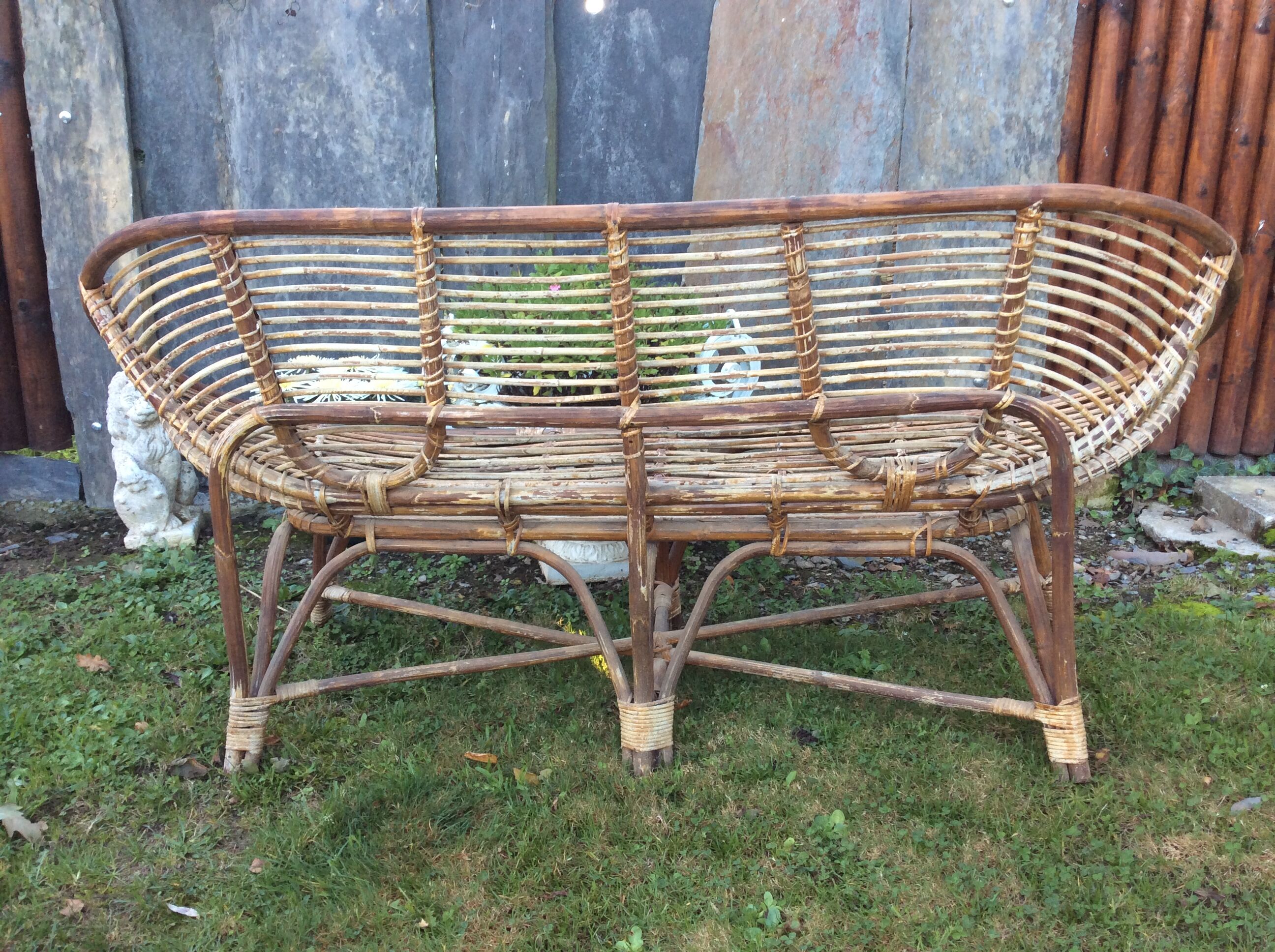 Set of 4 armchairs and 1 vintage rattan bench (5 pieces) inseparable.