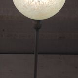 Table lamp with a pale green Clichy glass globe.