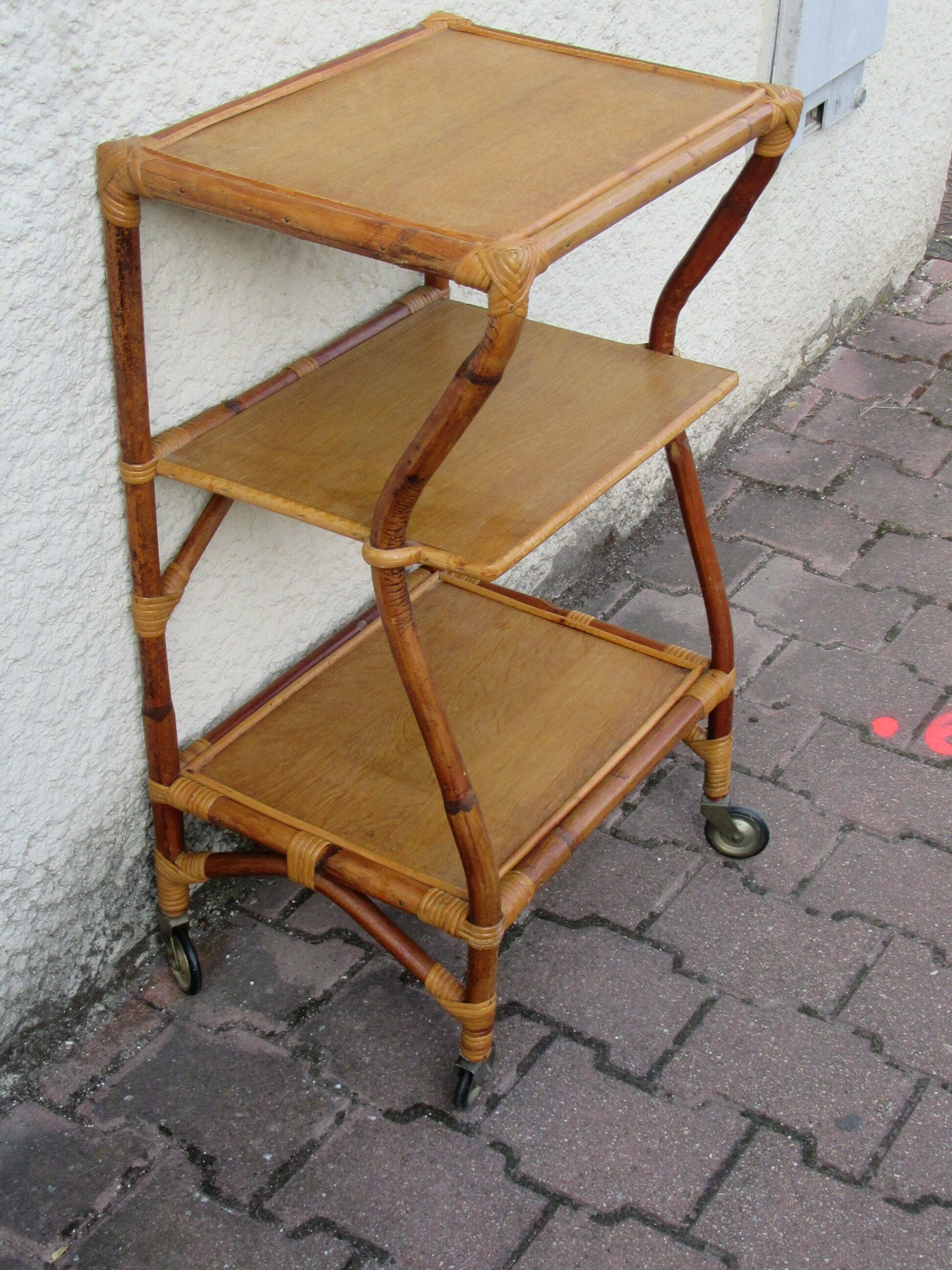 Rattan trolley on castors