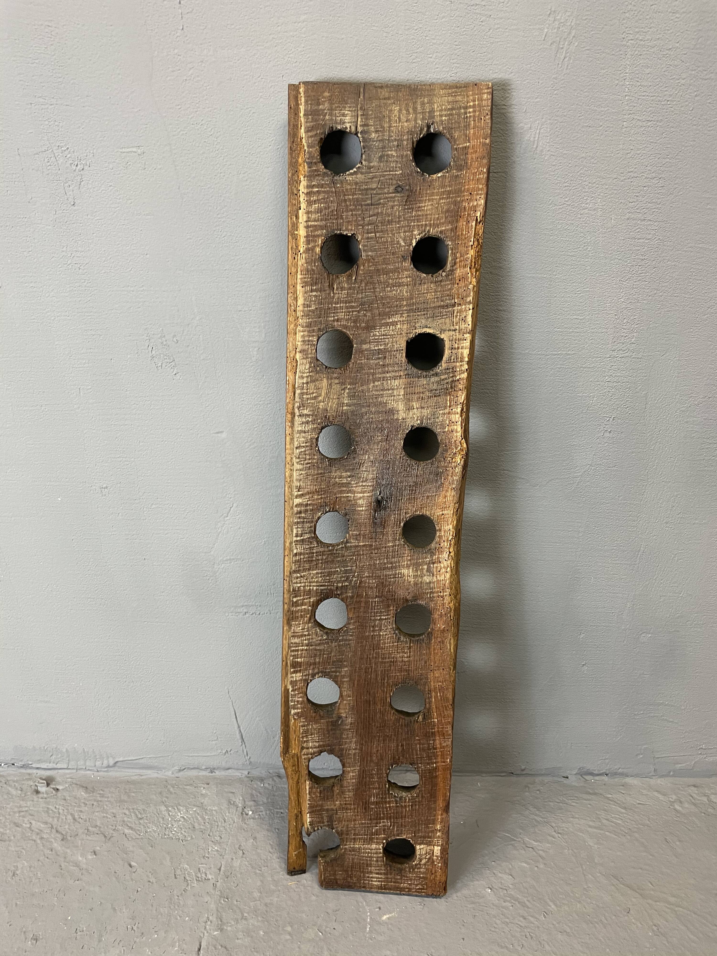 Brutalist oak bottle rack, late nineteenth century