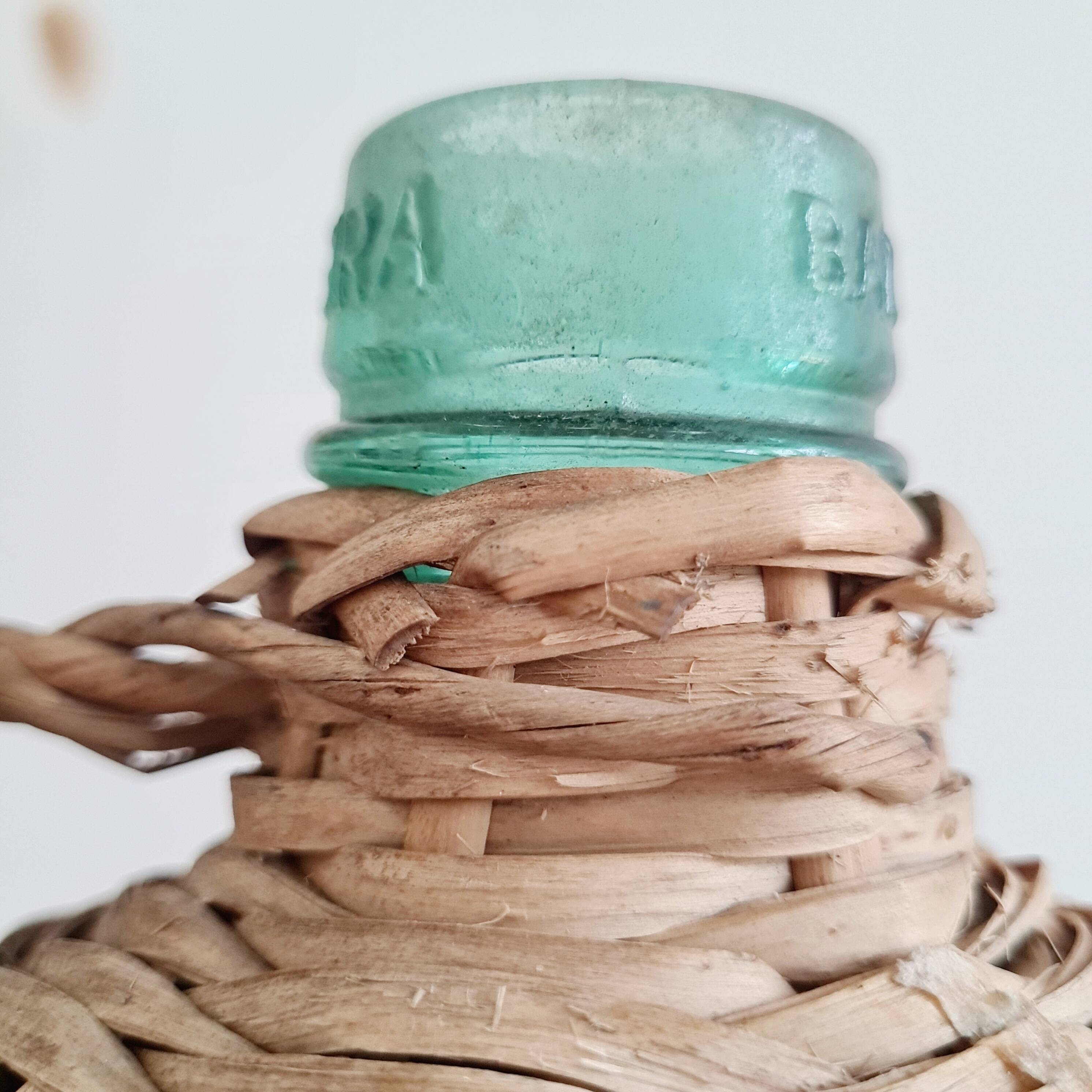 Glass and rattan demijohn carboy