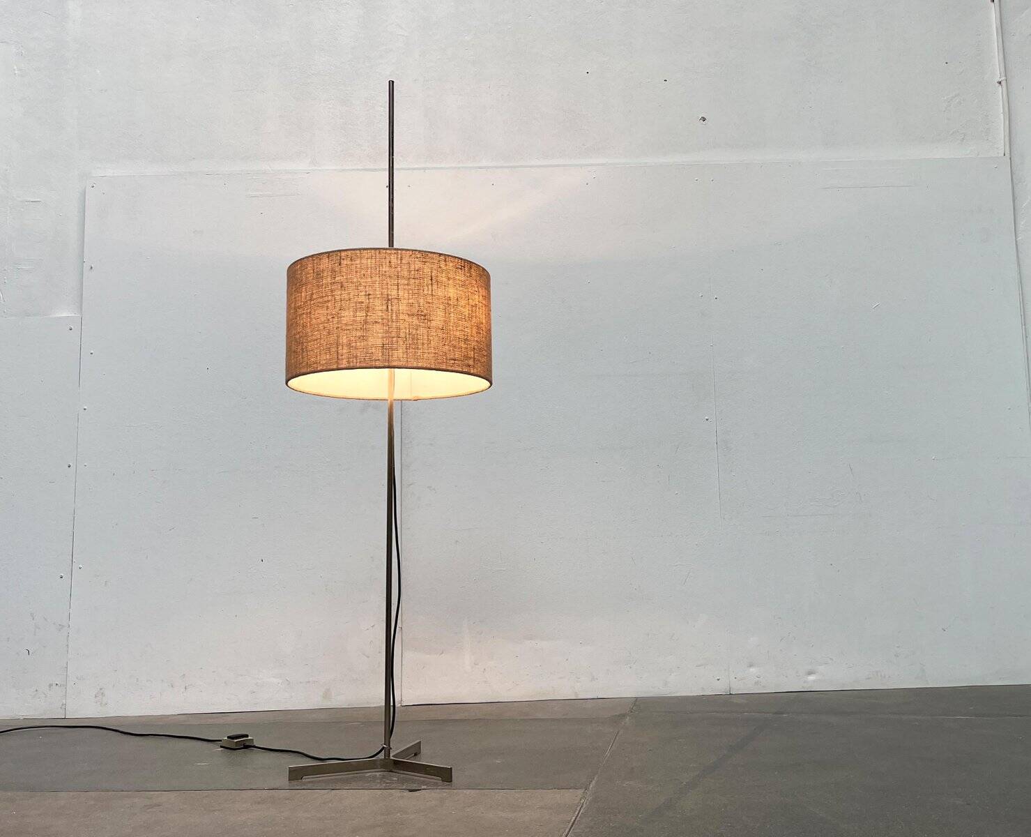 Minimalist German tripod floor lamp from the mid-century, 1960s.