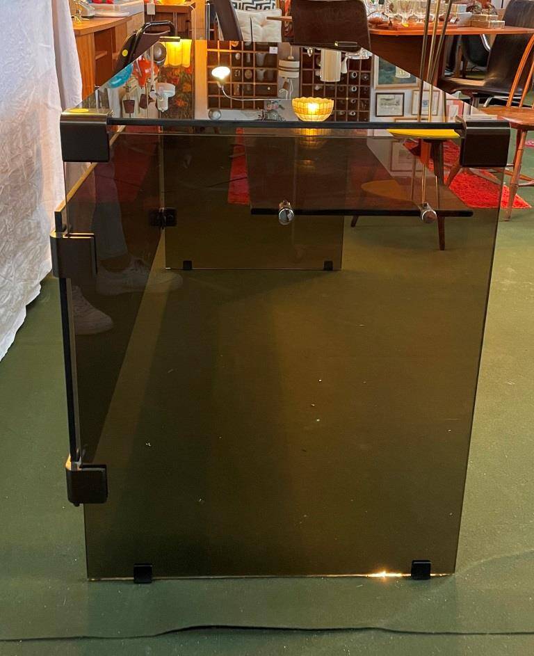 Smoked glass and metal desk, 1970s.