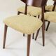 Green and walnut fabric dining chairs