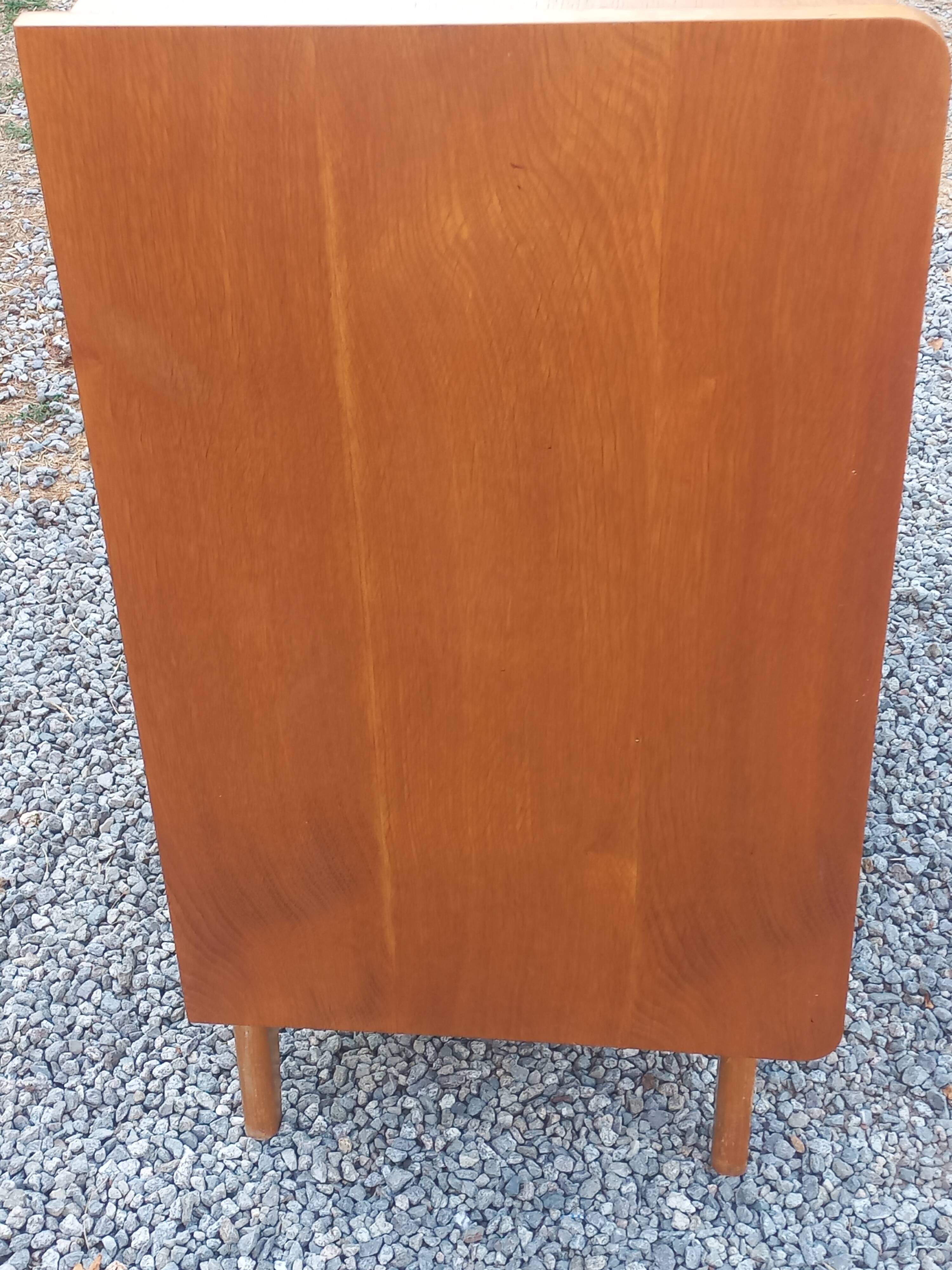 Commode vintage en chêne blond pieds compas 4 tiroirs 1950