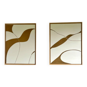 Diptych relief panels in cream and camel brown.
