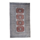 Vintage hand knotted rug with geometric patterns on a grey/beige/terracotta background 170 x 96 cm