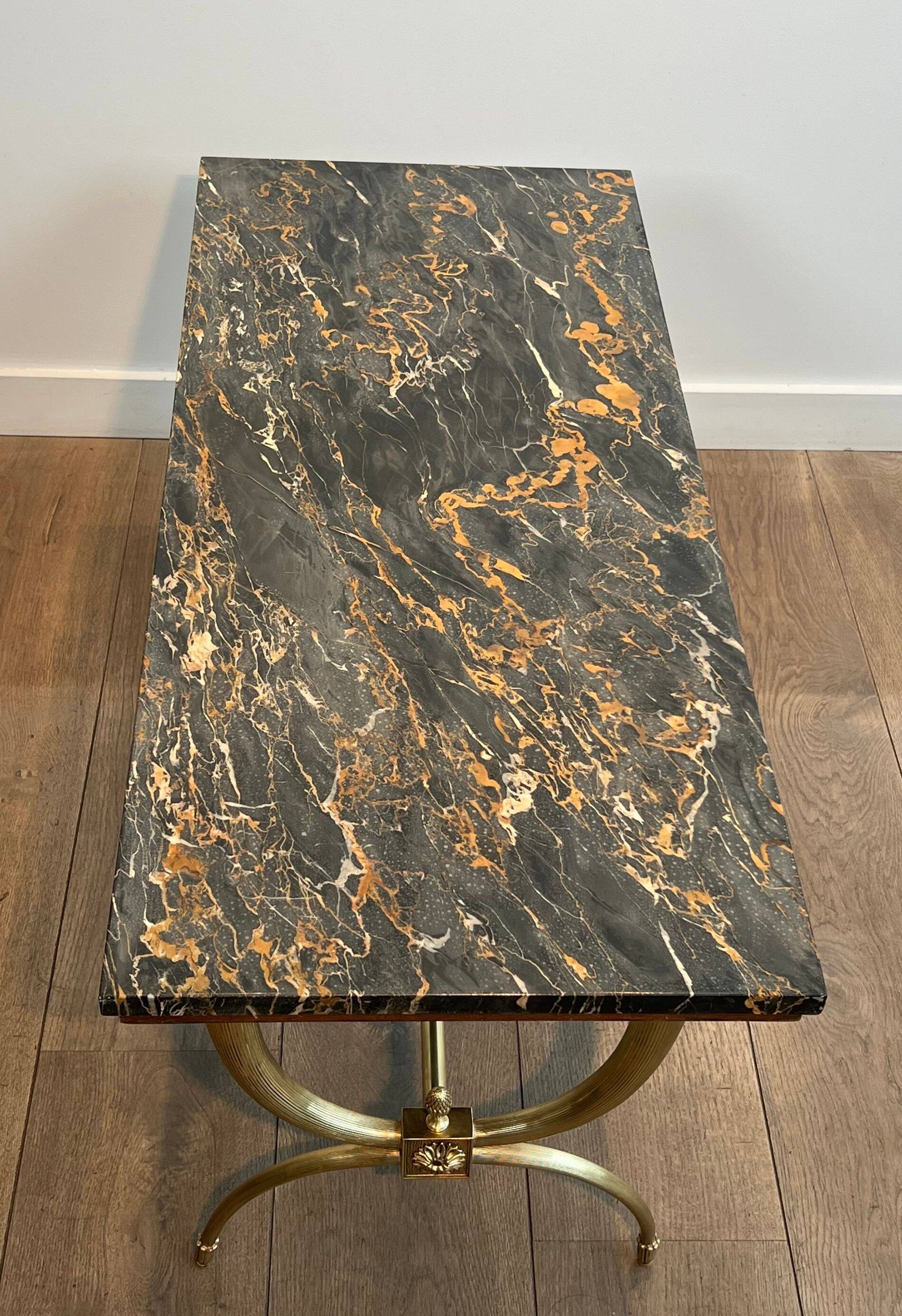 Neoclassical coffee table in brass and marble by Raymond Subes