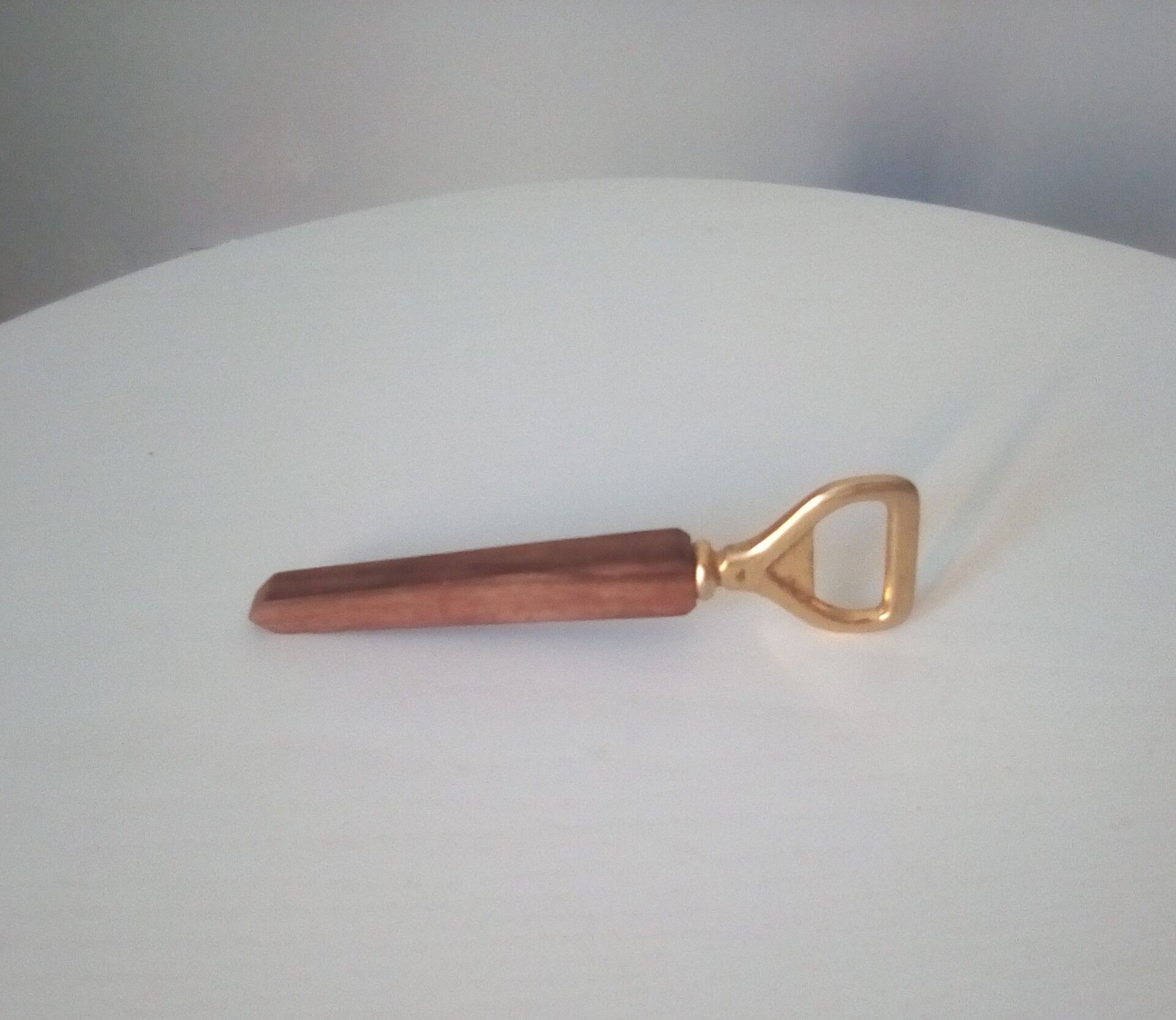 Vintage decapsulator in wood and gilded steel