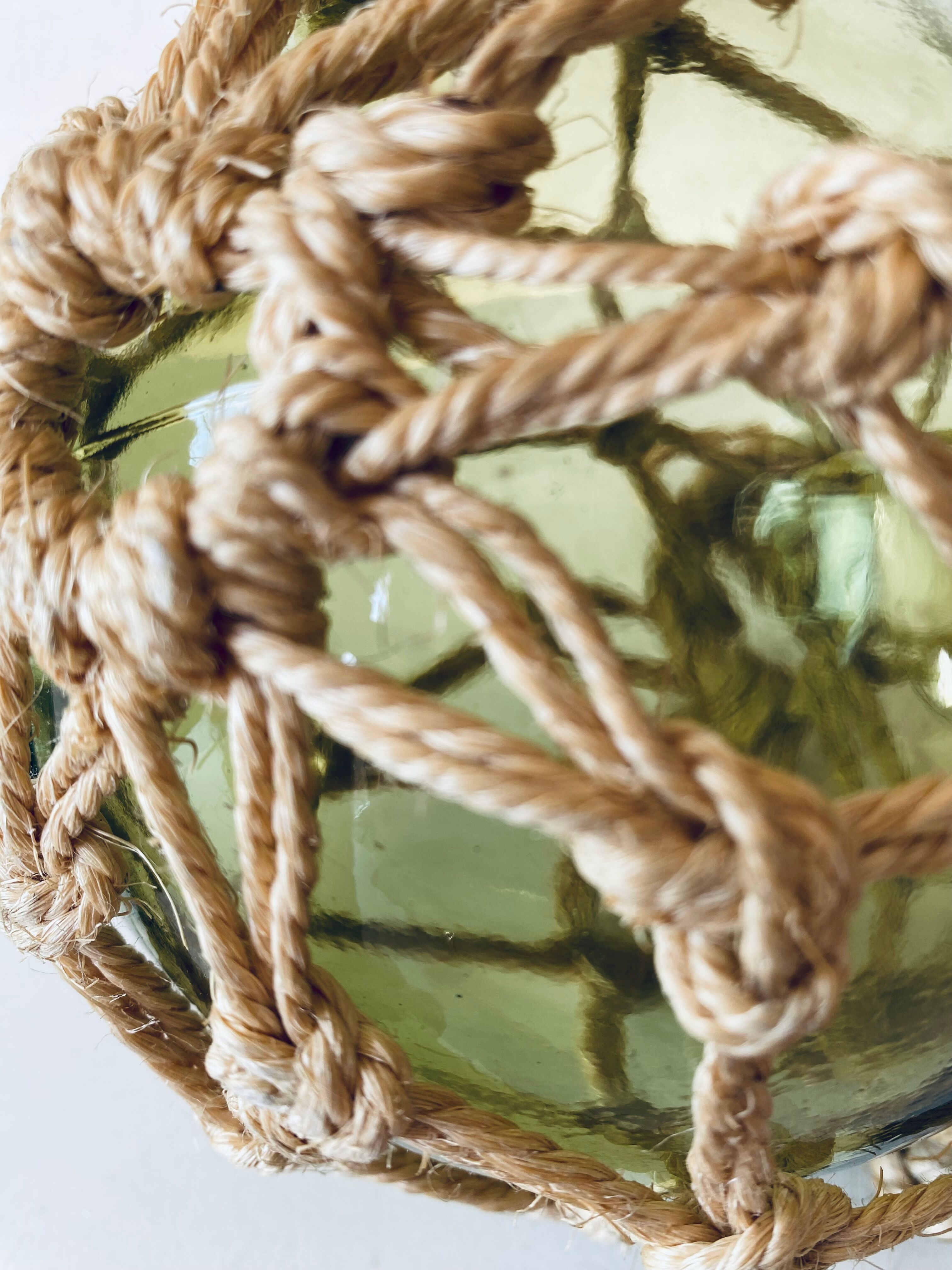 Antique fisherman's ball, old fishing floats