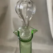 Liqueur carafe in ouraline with floral enamel decoration.