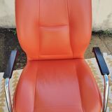 Orange leather cantilever tubular armchair