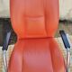 Orange leather cantilever tubular armchair