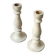 Pair of white wooden candlesticks