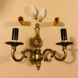 Louis XV Style double wall light in gilded bronze from the 20th century.