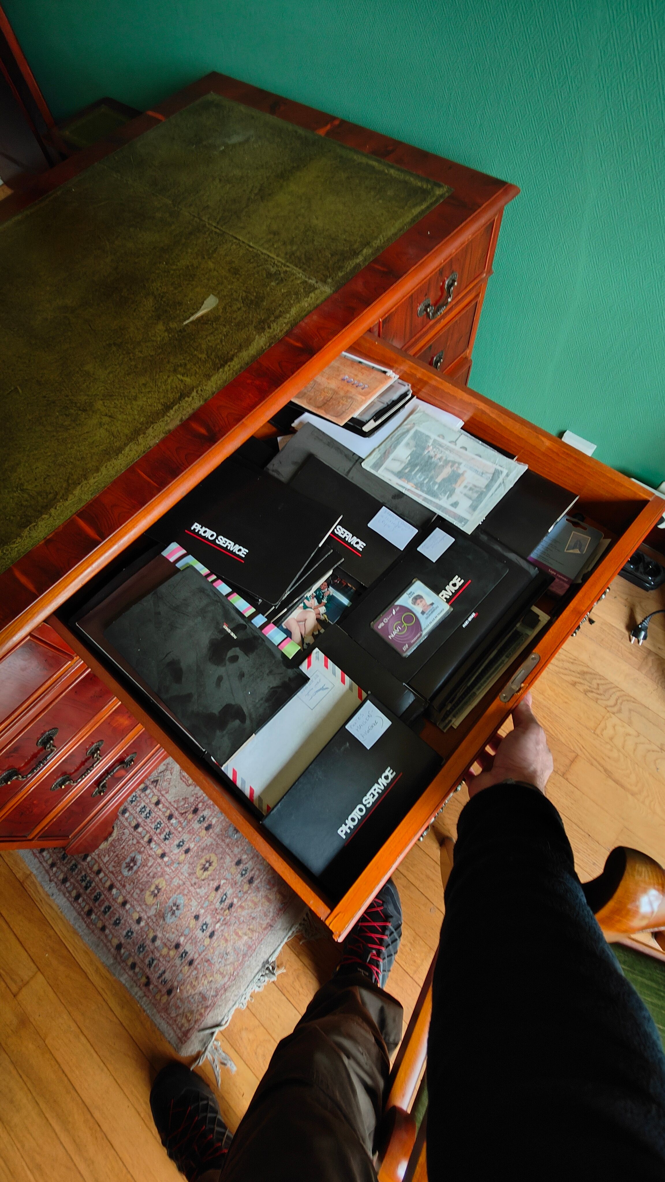 English-style mahogany desk and green leather top