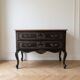 Louis XV black and wood commode