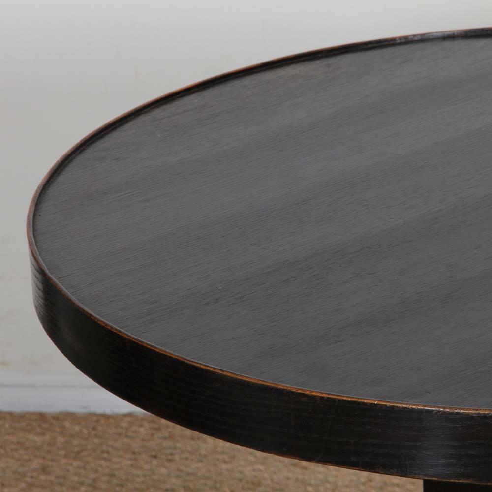 Round high wooden table, early 20th century craftsmanship.