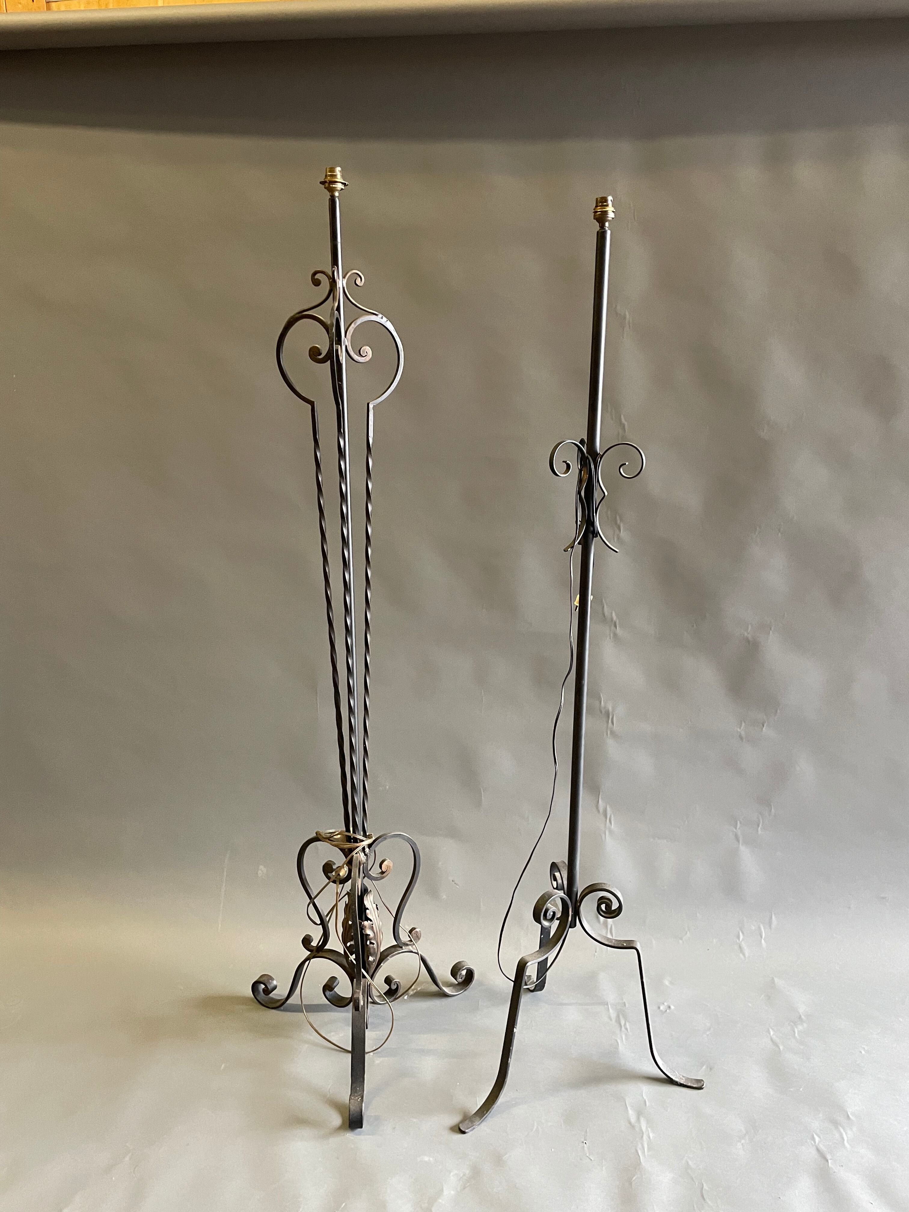 Two wrought iron lamp legs