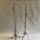 Two wrought iron lamp legs