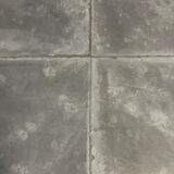 Gray square table in cement and metal by Julie Prisca