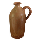 Vintage stoneware liqueur bottle with handle