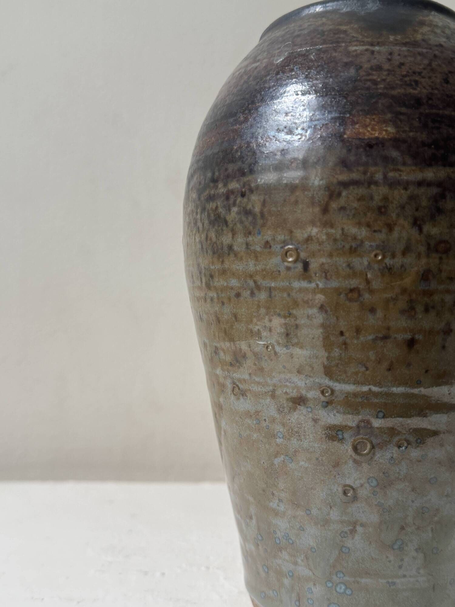 Brown-black glazed stoneware vase, signed underneath the base, circa 1950.