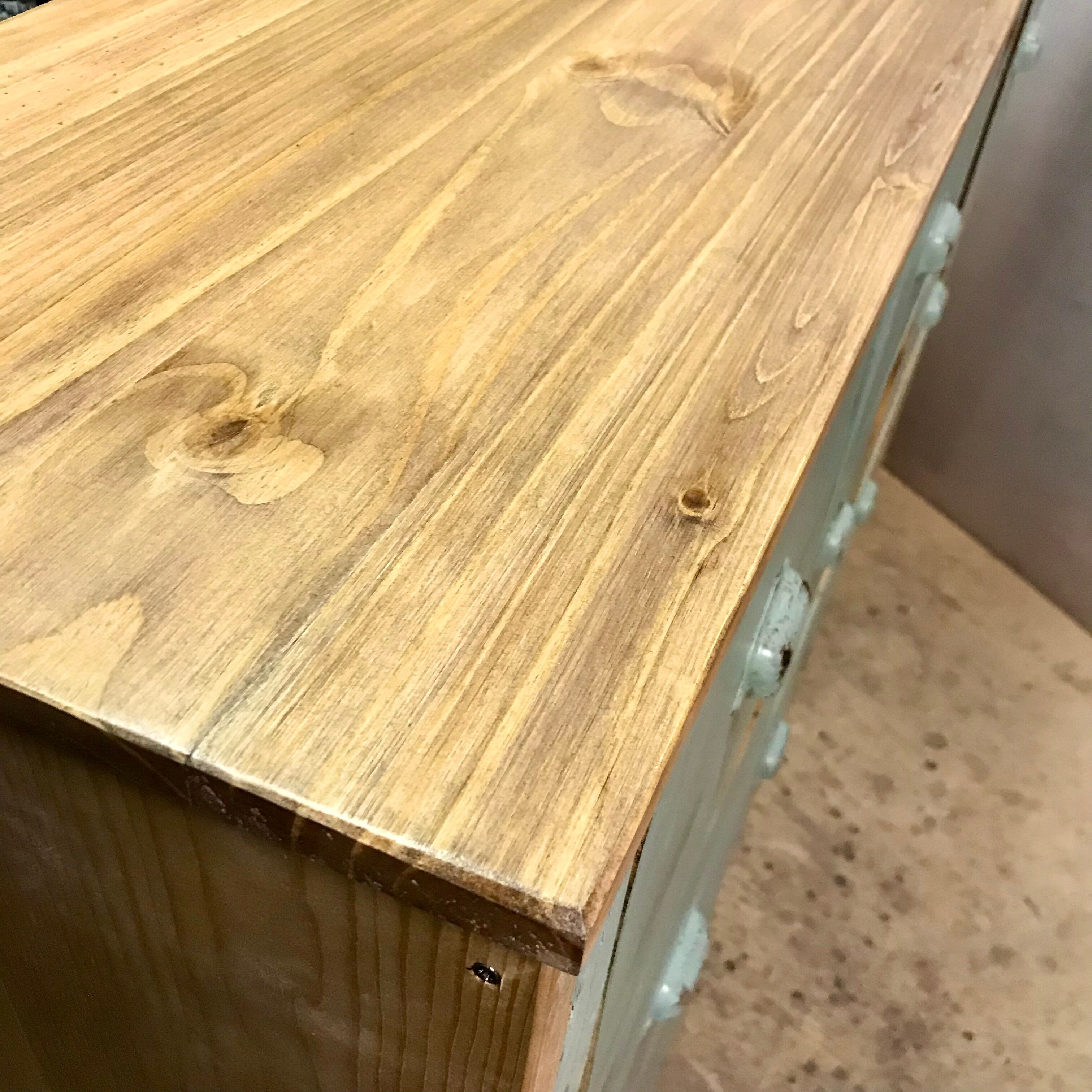 Furniture of metier enfilade with restored wooden drawers