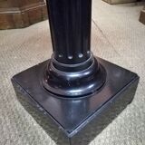 Black marble column