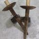 Pair of brutalist wall sconces in hammered and patinated iron, work from the years.