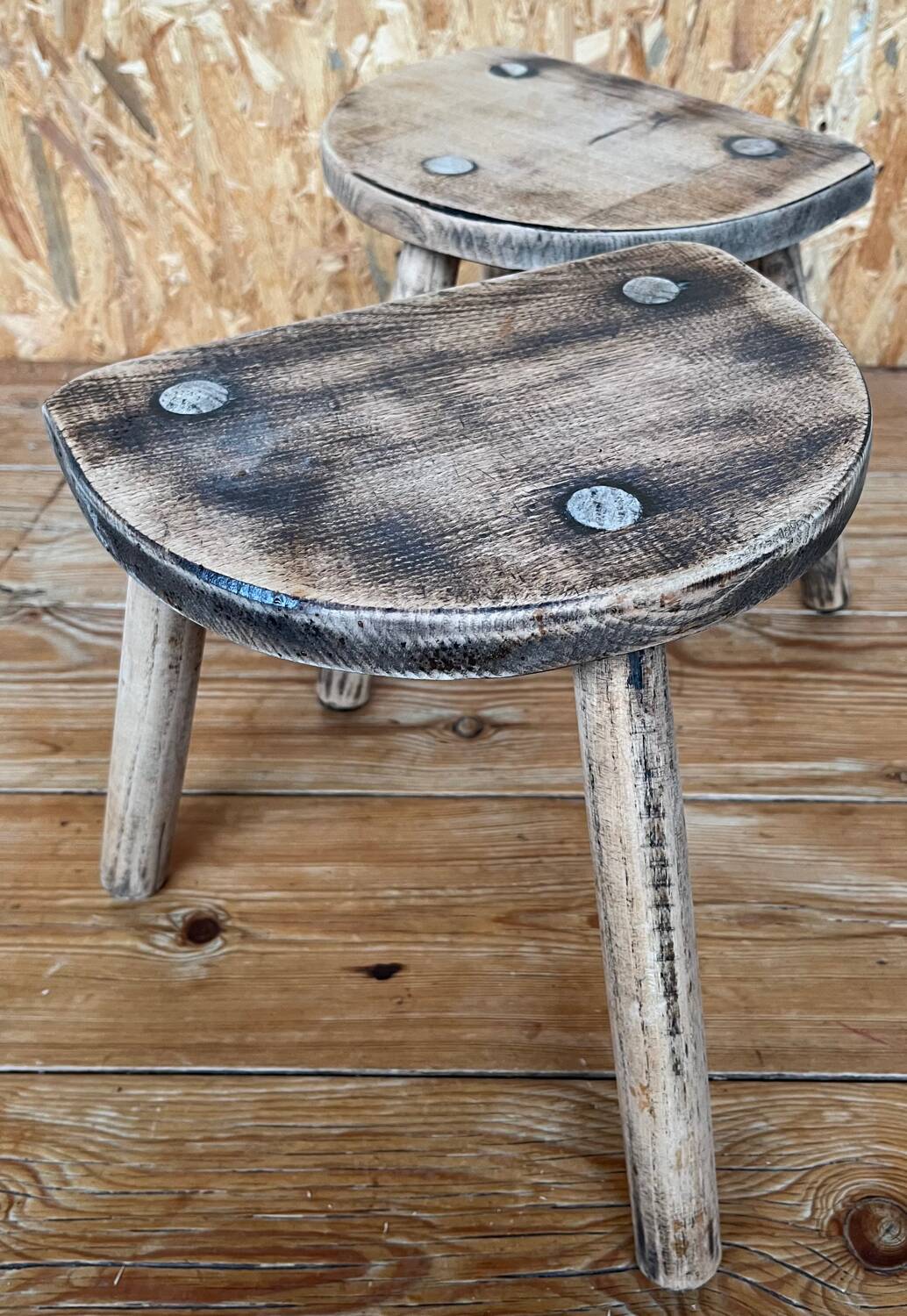 Pair of wooden tripod stools