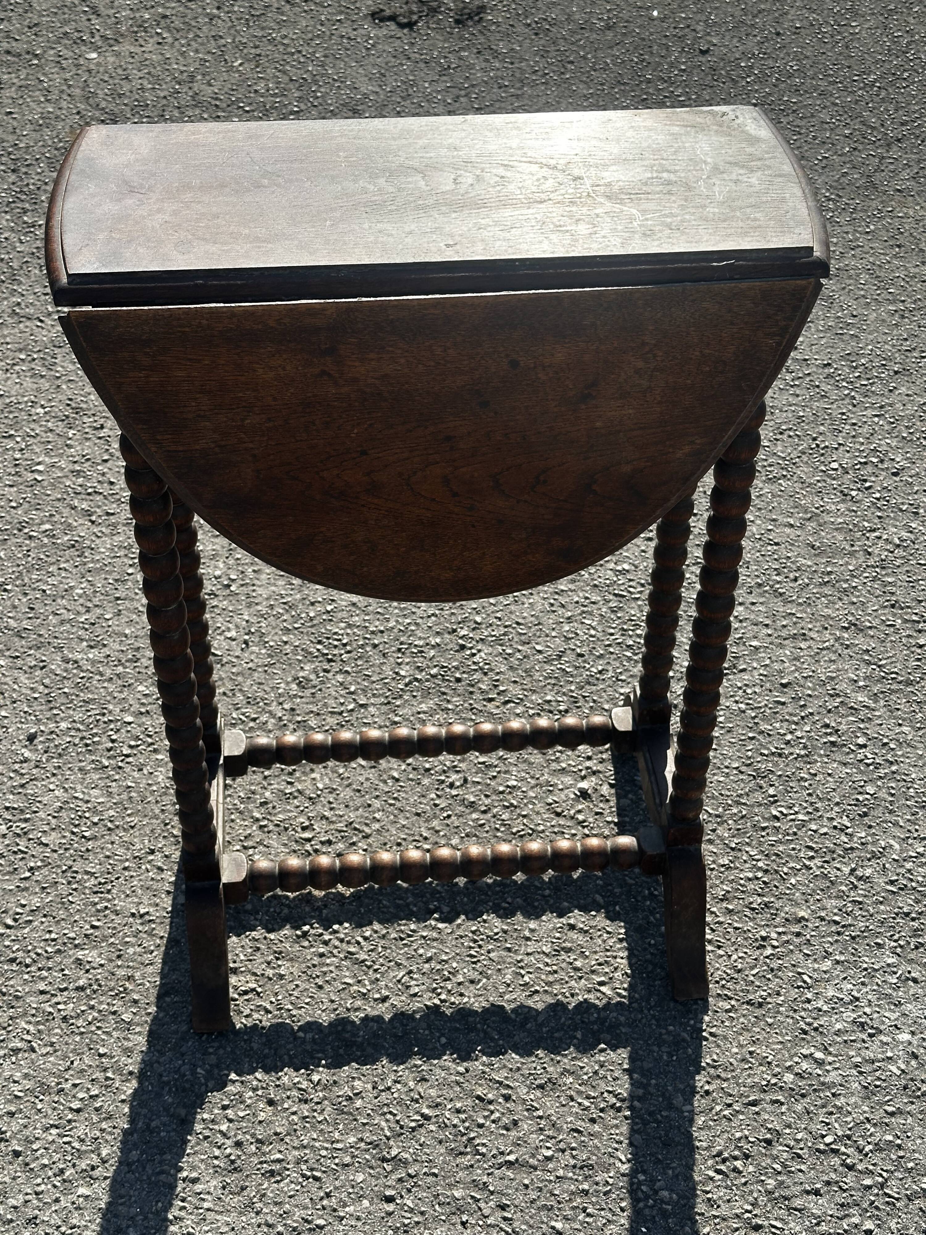 Small folding table called Gateleg, Victorian era