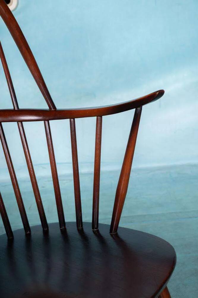 Ercol model 472 fireplace chair from the 1960s in beech.