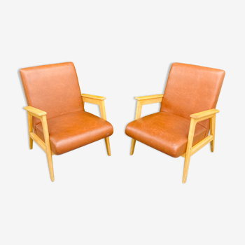 Paire de fauteuils des années 50 en skaï marron