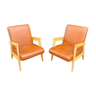 Pair of armchairs from the 50s in brown skaï