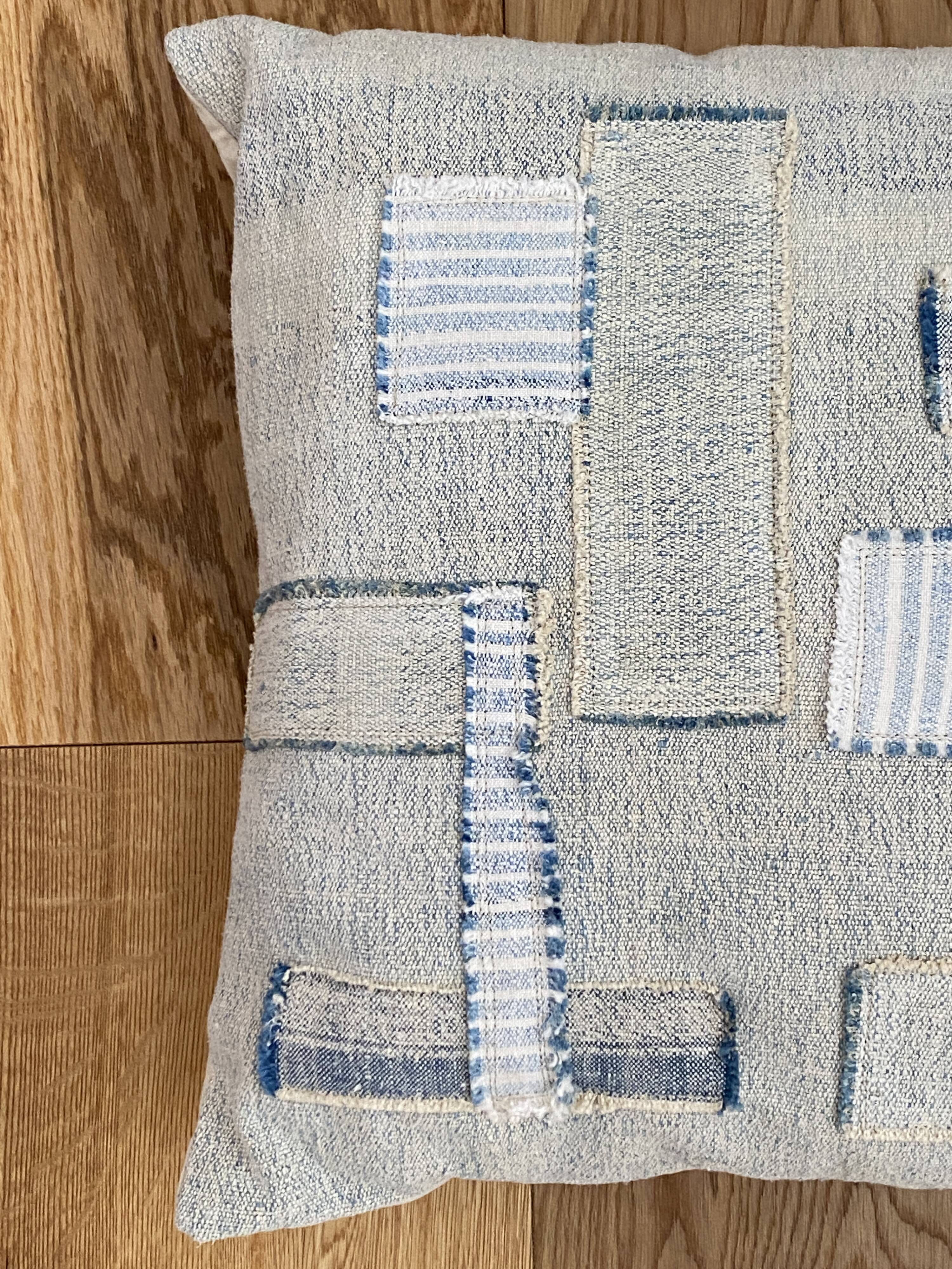 Old canvas cushion woven kilim style, patched