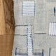 Old canvas cushion woven kilim style, patched