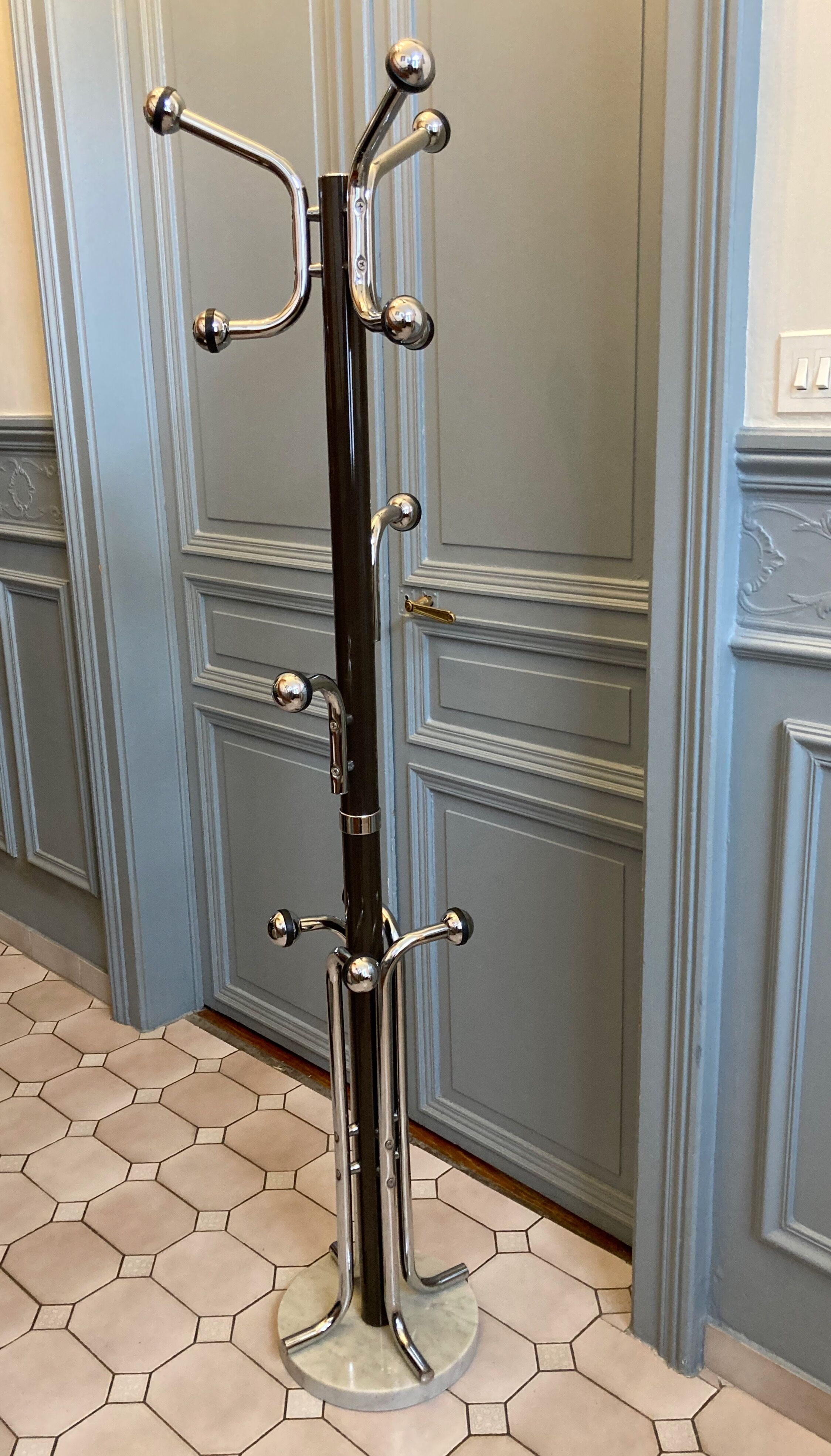 Coat rack on vintage stand