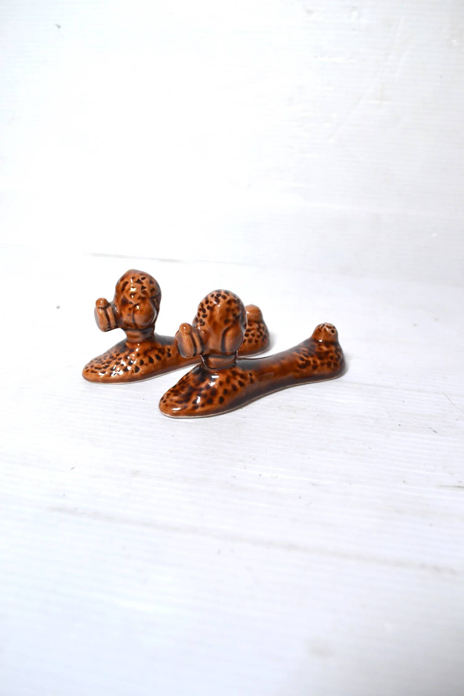 Vintage slip poodle knife holders