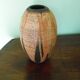 Poterie artisanale, vase en terre sigillée, cuisson raku