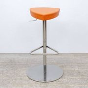 Adjustable orange swivel bar stool