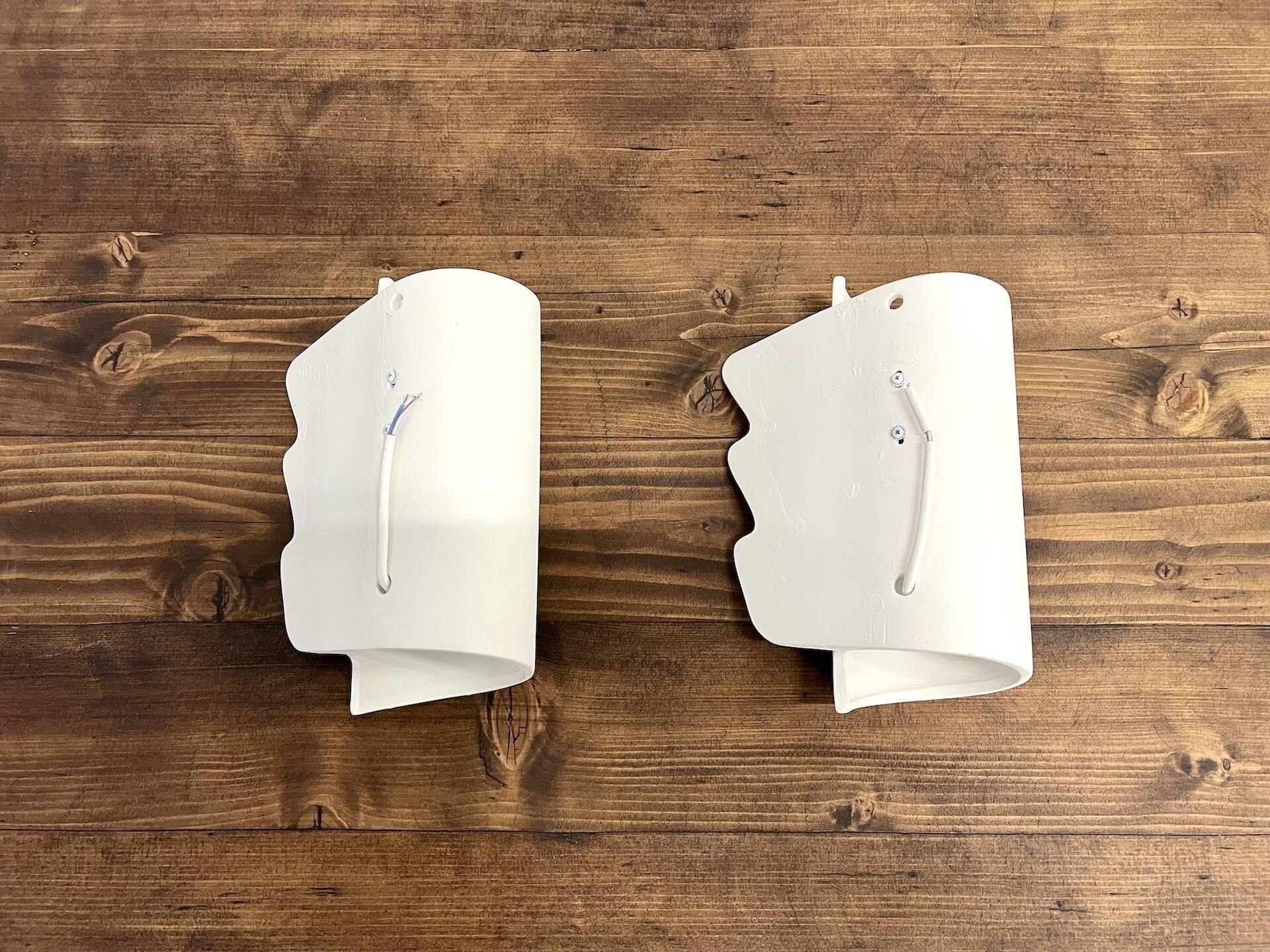 Pair of ceramic wall lights, circa 1990