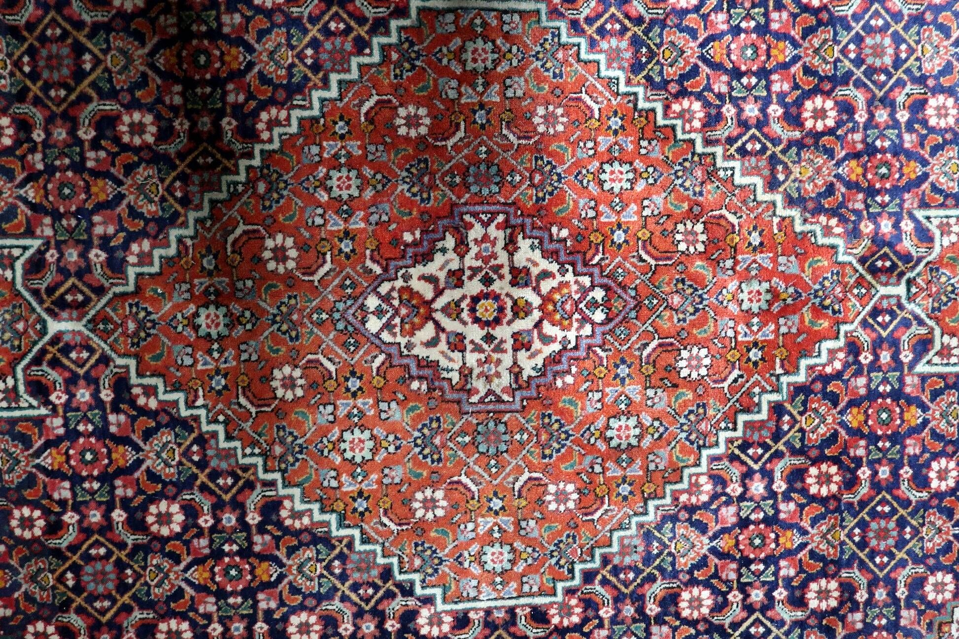 1940s vintage wool medallion rug, red and navy, 206 × 320 cm