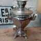 Old Russian electric samovar in silver-plated metal.