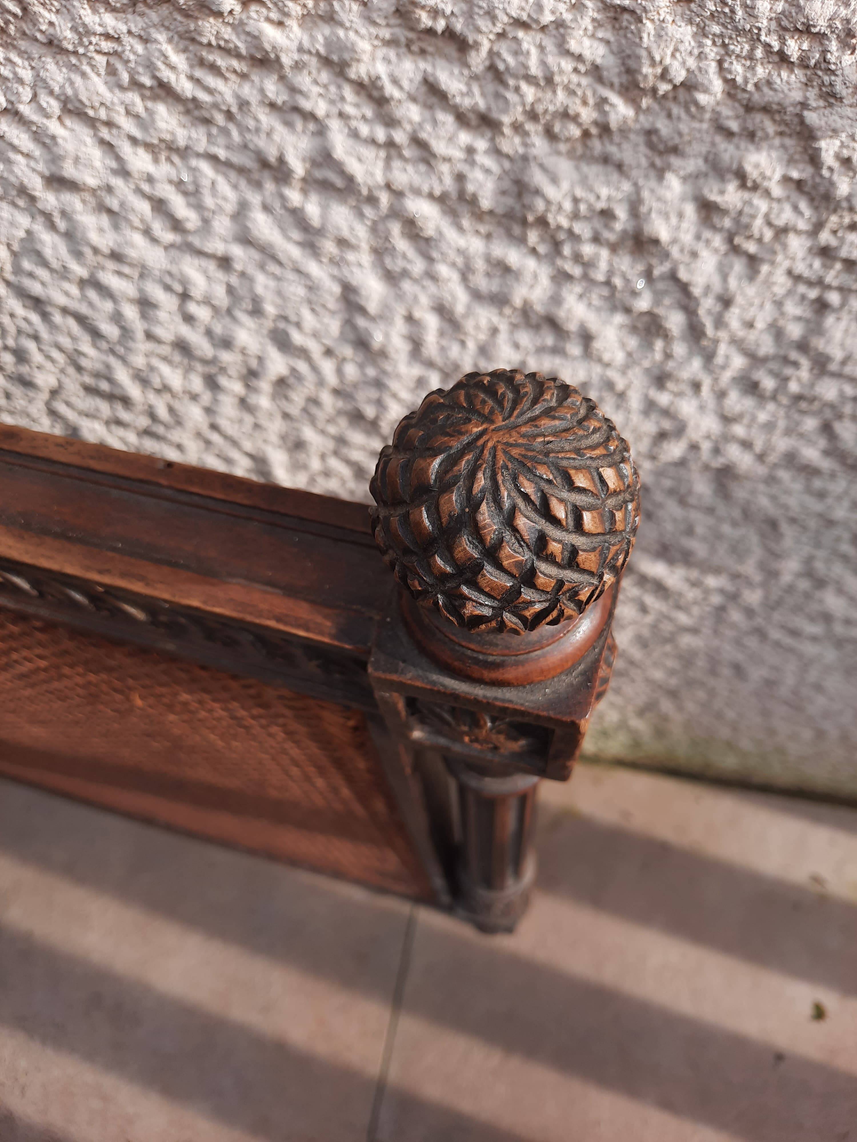 Hand-carved Louis XVI style headboards with chic vintage caning (1800s)
