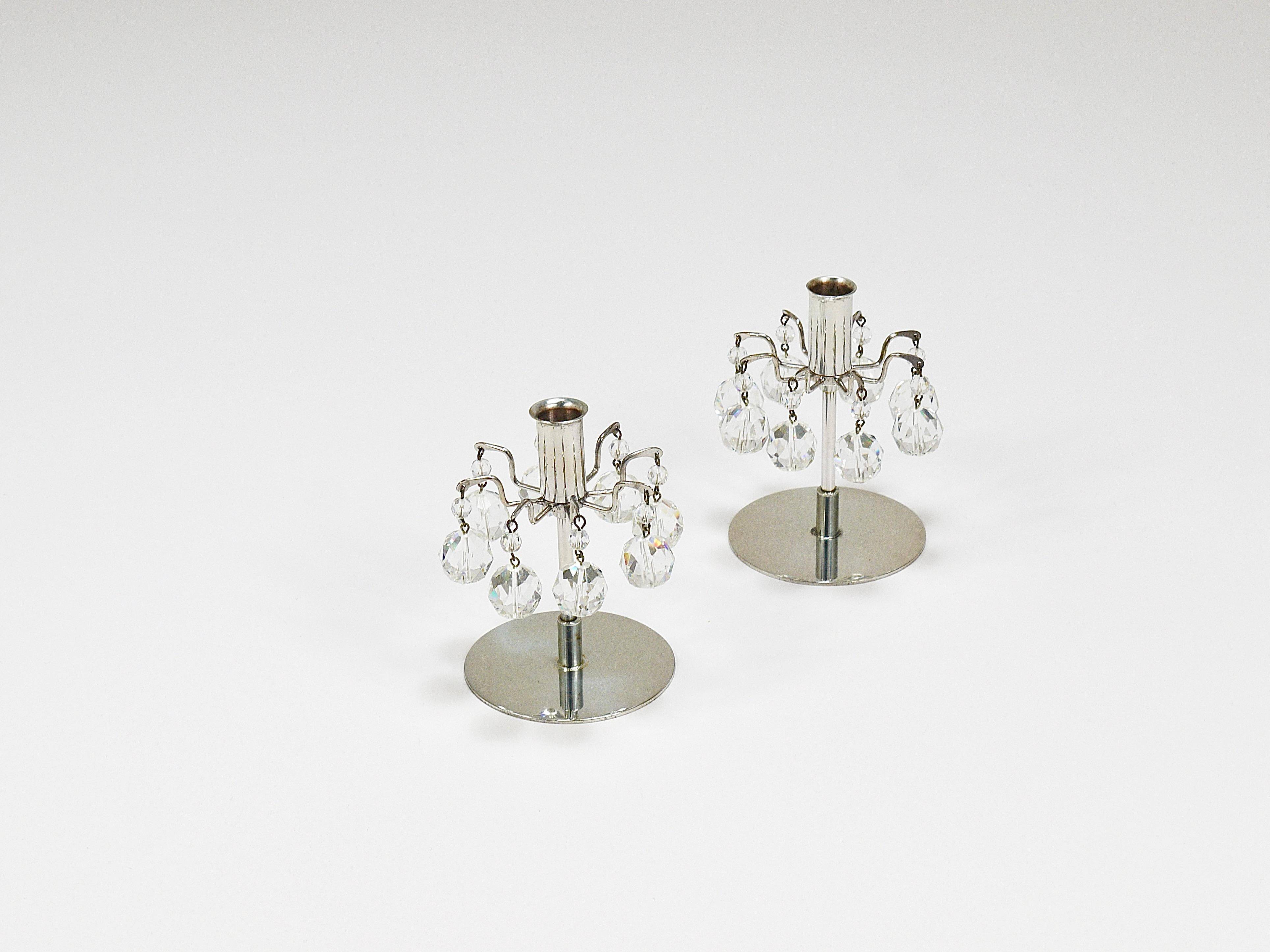 Pair of candlesticks "Lights of Vienna" J.L. Lobmeyr, faceted Swarovski crystals