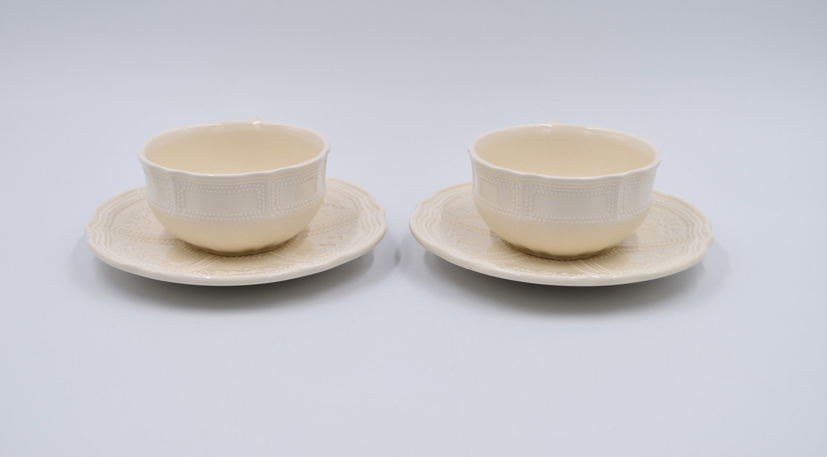 2 luncheon cups off-white earthenware Lunéville décor relief France