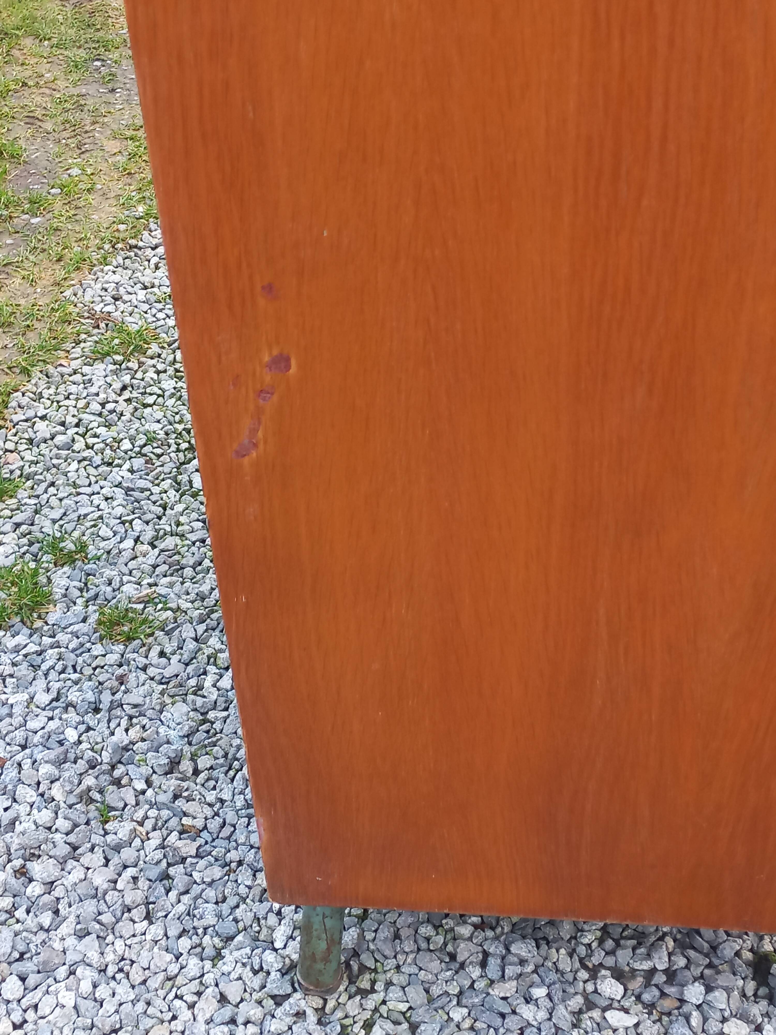 Vintage oak wardrobe with metal legs from the 1950s.